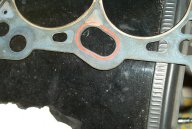 Head gasket upside down looking at surface that mates to head